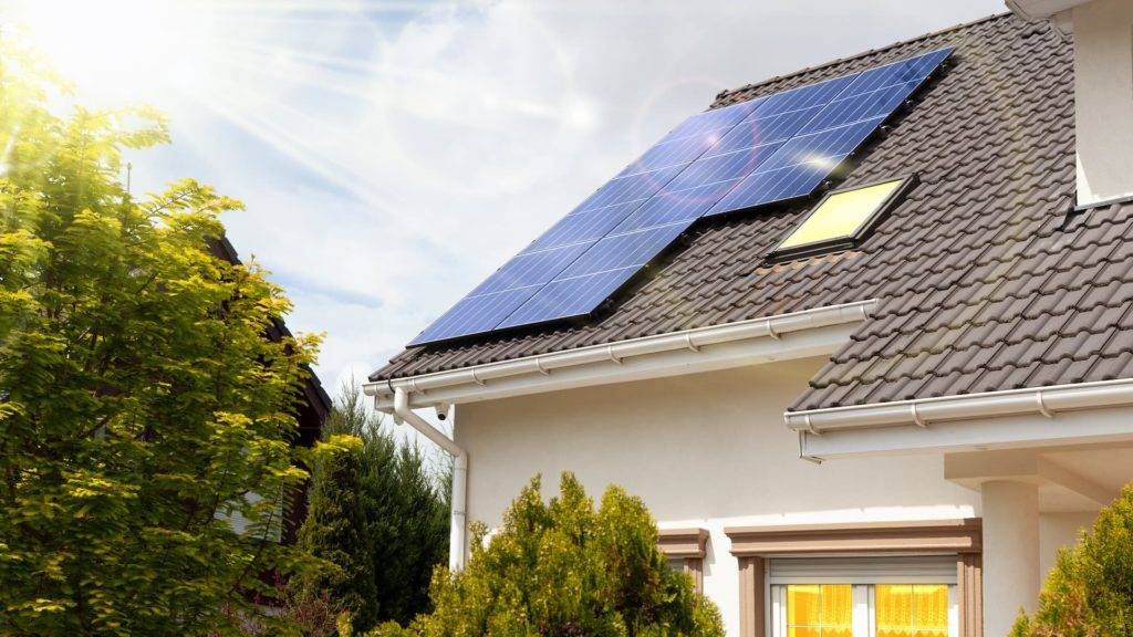 Solar panels on house on a sunny day